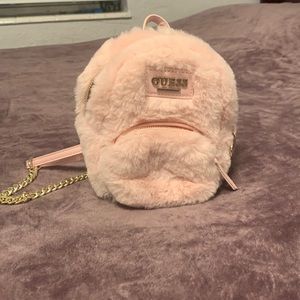 Never used, mini Guess book bag